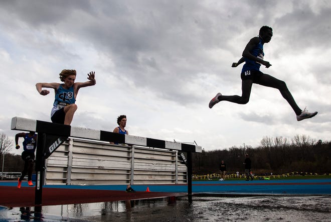 Men's competitors compete in the 3,000 meter steeplechase during the Musco Twilight NCAA outdoor track and field meet, Saturday, April 23, 2022, at Francis X. Cretzmeyer Track in Iowa City, Iowa.