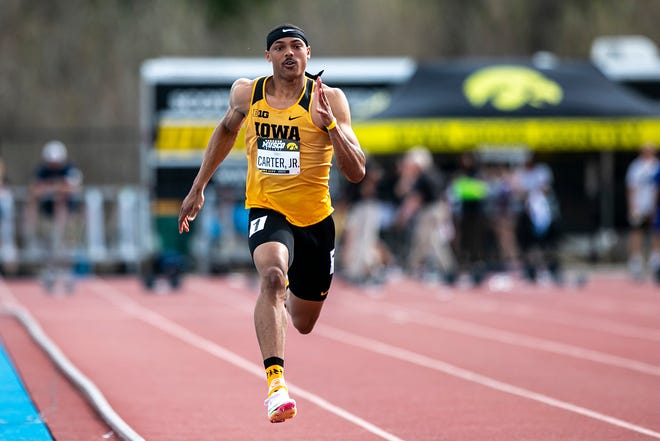 Iowa's James Carter, Jr. competes in the 200 meter dash during the Musco Twilight NCAA outdoor track and field meet, Saturday, April 23, 2022, at Francis X. Cretzmeyer Track in Iowa City, Iowa.