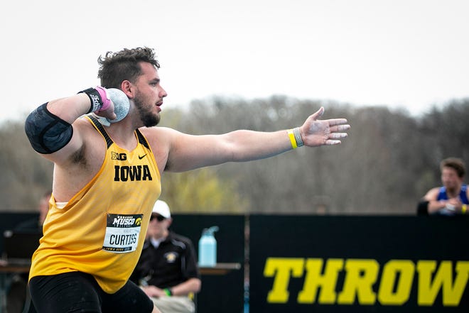 Iowa's Nik Curtiss competes in shot put during the Musco Twilight NCAA outdoor track and field meet, Saturday, April 23, 2022, at Francis X. Cretzmeyer Track in Iowa City, Iowa.
