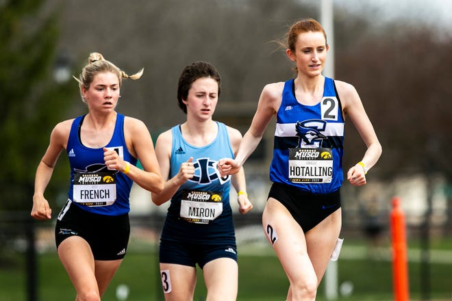 Creighton's Danielle Hotalling, right, leads in the steeplechase ahead of Iowa Western Community College's Josey French, left, and Iowa Central Community College's Kate Miron while competing in the 3,000 meter steeplechase during the Musco Twilight NCAA outdoor track and field meet, Saturday, April 23, 2022, at Francis X. Cretzmeyer Track in Iowa City, Iowa.