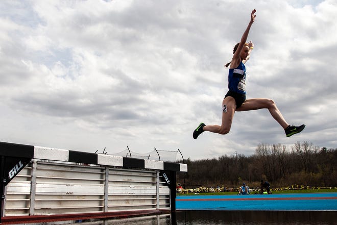 Creighton's Danielle Hotalling clears an obstacle over the water while competing in the 3,000 meter steeplechase during the Musco Twilight NCAA outdoor track and field meet, Saturday, April 23, 2022, at Francis X. Cretzmeyer Track in Iowa City, Iowa.