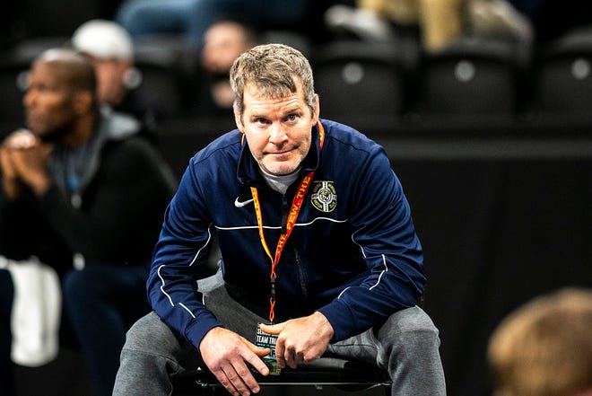 Iowa head coach Tom Brands watches a match during the first session of the USA Wrestling World Team Trials Challenge Tournament, Saturday, May 21, 2022, at Xtream Arena in Coralville, Iowa.