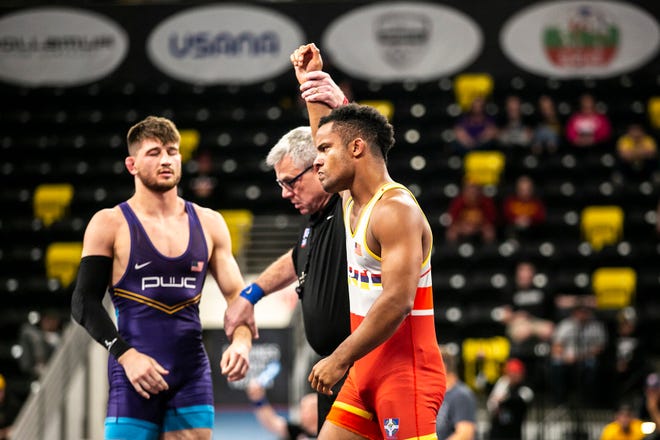 Mark Hall, right, has his hand raised after scoring a fall against Drew Foster at 86 kg during the second session of the USA Wrestling World Team Trials Challenge Tournament, Saturday, May 21, 2022, at Xtream Arena in Coralville, Iowa.