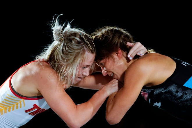 Felicity Taylor, left, and Dom Parrish wrestle in the first round of Final X NYC wrestling at the Hulu Theater at Madison Square Garden on Wednesday, June 8, 2022.