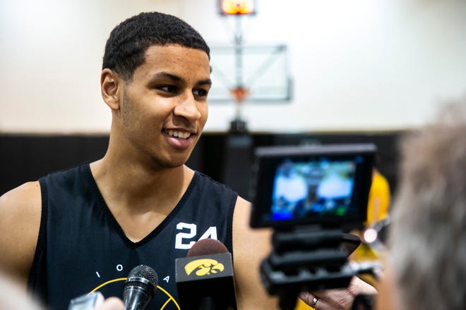 Iowa forward Kris Murray speaks with reporters before a NCAA men's basketball summer practice, Wednesday, June 15, 2022, at Carver-Hawkeye Arena in Iowa City, Iowa.