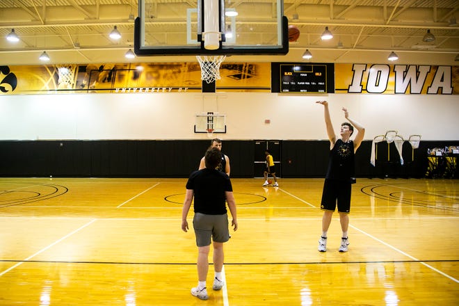 Iowa center Riley Mulvey, right, and Iowa guard Carter Kingsbury warm up before a NCAA men's basketball summer practice, Wednesday, June 15, 2022, at Carver-Hawkeye Arena in Iowa City, Iowa.