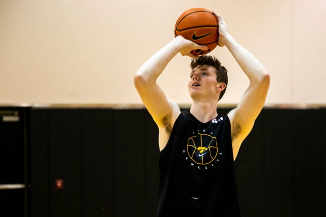 Iowa center Riley Mulvey warms up before a NCAA men's basketball summer practice, Wednesday, June 15, 2022, at Carver-Hawkeye Arena in Iowa City, Iowa.