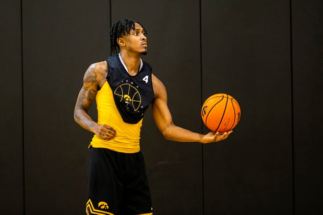 Iowa guard Ahron Ulis warms up before a NCAA men's basketball summer practice, Wednesday, June 15, 2022, at Carver-Hawkeye Arena in Iowa City, Iowa.