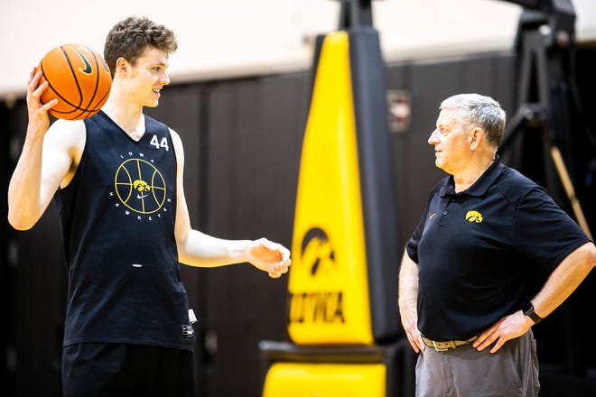 Iowa center Riley Mulvey, left, talks with former Iowa assistant coach Kirk Speraw before a NCAA men's basketball summer practice, Wednesday, June 15, 2022, at Carver-Hawkeye Arena in Iowa City, Iowa.