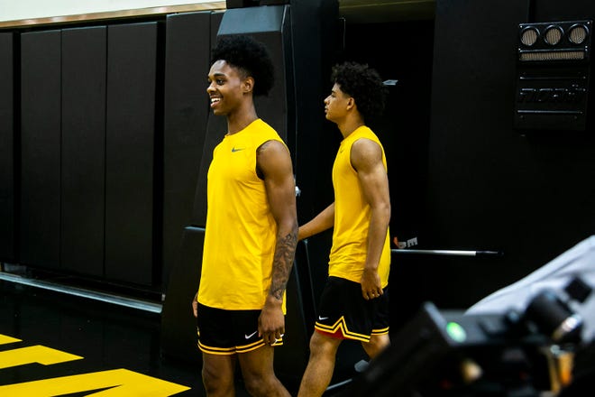 Iowa's Dasonte Bowen, left, and Amarion Nimmers walk out onto the court before a NCAA men's basketball summer practice, Wednesday, June 15, 2022, at Carver-Hawkeye Arena in Iowa City, Iowa.