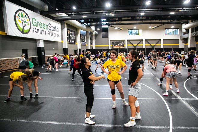 Iowa women's wrestling head coach Clarissa Chun gives instruction during a girls wrestling technique camp, Wednesday, July 6, 2022, at the GreenState Family Fieldhouse in Coralville, Iowa.