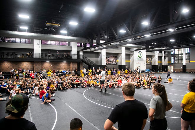 Iowa men's wrestling volunteer assistant coach Bobby Telford speaks during a girls wrestling technique camp, Wednesday, July 6, 2022, at the GreenState Family Fieldhouse in Coralville, Iowa.