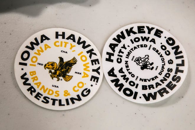 Stickers for Iowa wrestling are seen during a girls wrestling technique camp, Wednesday, July 6, 2022, at the GreenState Family Fieldhouse in Coralville, Iowa.