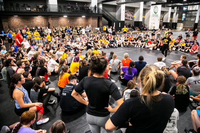 Iowa women's wrestling head coach Clarissa Chun speaks during a girls wrestling technique camp, Wednesday, July 6, 2022, at the GreenState Family Fieldhouse in Coralville, Iowa.