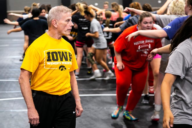 Iowa women's wrestling associate head coach Gary Mayabb gives instruction during a girls wrestling technique camp, Wednesday, July 6, 2022, at the GreenState Family Fieldhouse in Coralville, Iowa.