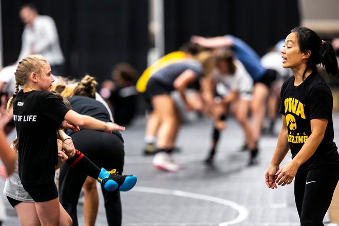 Iowa women's wrestling head coach Clarissa Chun gives instruction during a girls wrestling technique camp, Wednesday, July 6, 2022, at the GreenState Family Fieldhouse in Coralville, Iowa.