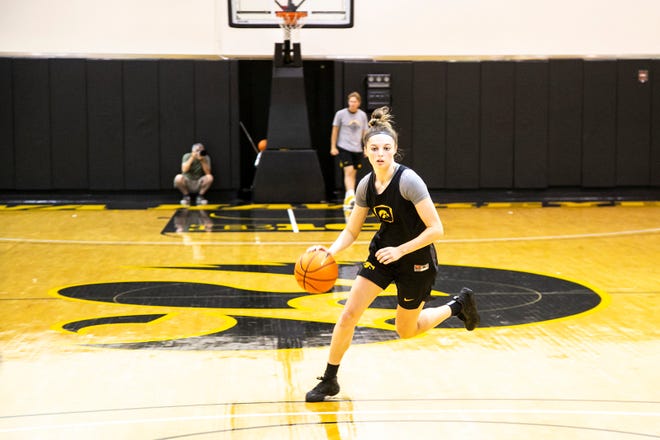 Iowa guard Taylor McCabe dribbles during a summer NCAA women's basketball practice, Friday, July 29, 2022, at Carver-Hawkeye Arena in Iowa City, Iowa.