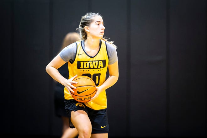 Iowa guard Kate Martin passes the ball during a summer NCAA women's basketball practice, Friday, July 29, 2022, at Carver-Hawkeye Arena in Iowa City, Iowa.