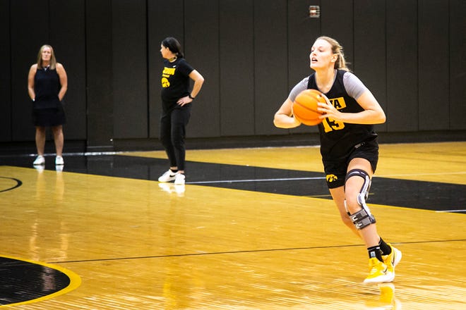 Iowa forward Shateah Wetering passes the ball during a summer NCAA women's basketball practice, Friday, July 29, 2022, at Carver-Hawkeye Arena in Iowa City, Iowa.