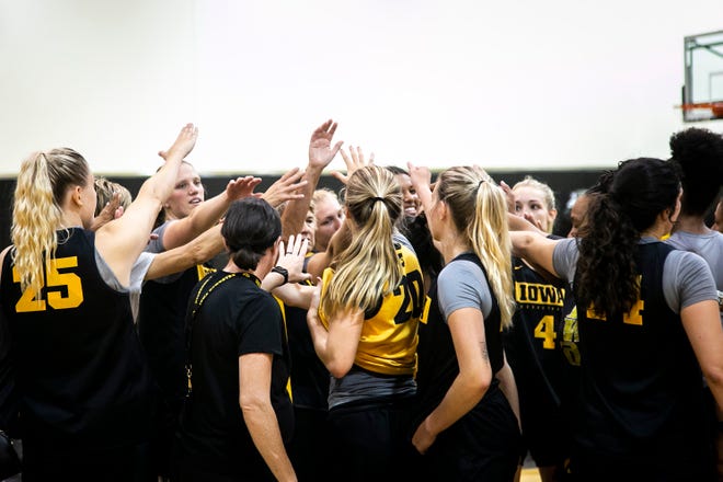 Iowa Hawkeyes players huddle up during a summer NCAA women's basketball practice, Friday, July 29, 2022, at Carver-Hawkeye Arena in Iowa City, Iowa.