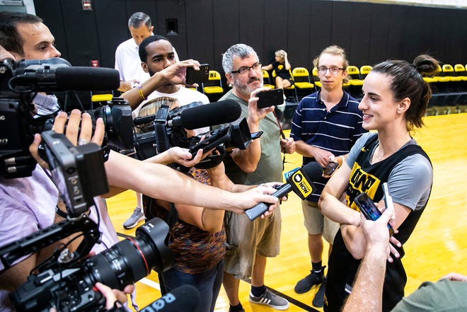 Iowa guard Caitlin Clark speaks to reporters after a summer NCAA women's basketball practice, Friday, July 29, 2022, at Carver-Hawkeye Arena in Iowa City, Iowa.
