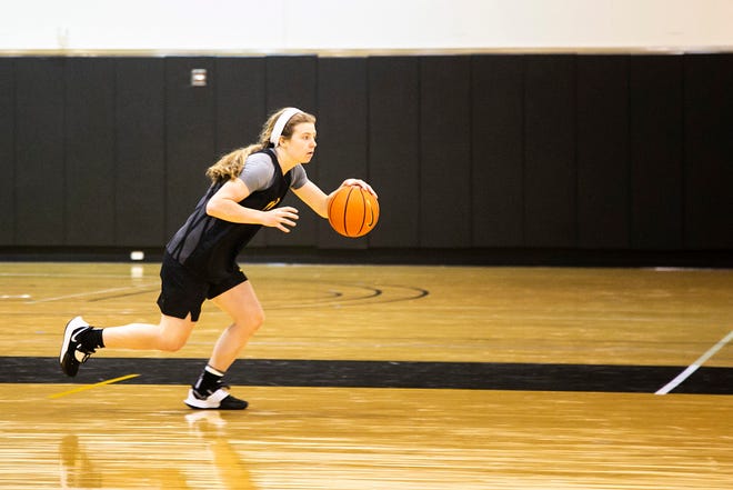 Iowa guard Molly Davis dribbles during a summer NCAA women's basketball practice, Friday, July 29, 2022, at Carver-Hawkeye Arena in Iowa City, Iowa.