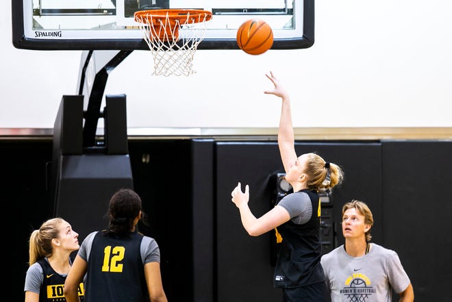 Iowa's Addison O'Grady makes a basket during a summer NCAA women's basketball practice, Friday, July 29, 2022, at Carver-Hawkeye Arena in Iowa City, Iowa.