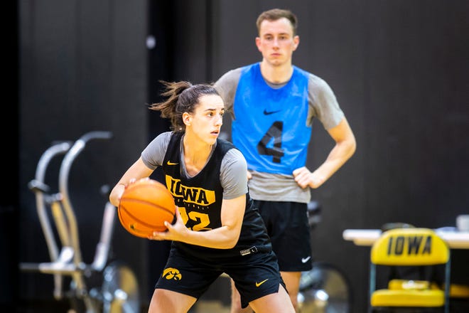 Iowa guard Caitlin Clark looks to pass during a summer NCAA women's basketball practice, Friday, July 29, 2022, at Carver-Hawkeye Arena in Iowa City, Iowa.