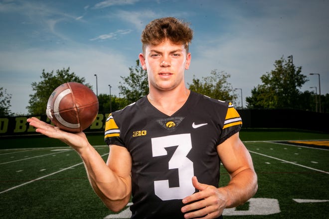 Cooper DeJean stands for a photo during Hawkeye football media day in Iowa City, Friday, Aug. 12, 2022.