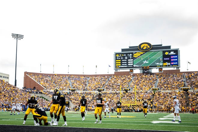 Iowa defensive back Cooper DeJean (3) downs a punt inside the 1-yard-line during a NCAA football game against South Dakota State, Saturday, Sept. 3, 2022, at Kinnick Stadium in Iowa City, Iowa.