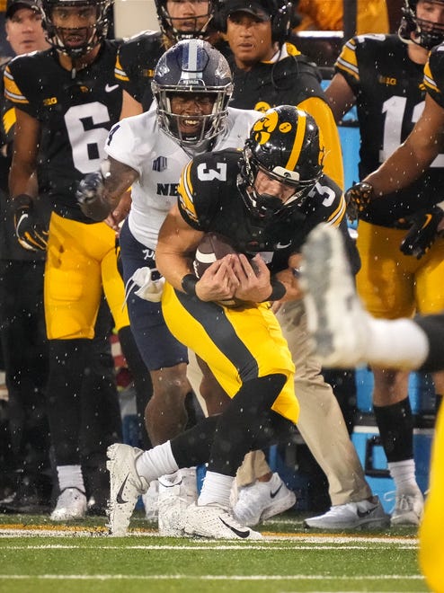 Iowa defensive back Cooper DeJean intercepts a pass in the first quarter against Nevada during a non-conference NCAA football game on Saturday, Sept. 17, 2022, at Kinnick Stadium in Iowa City.