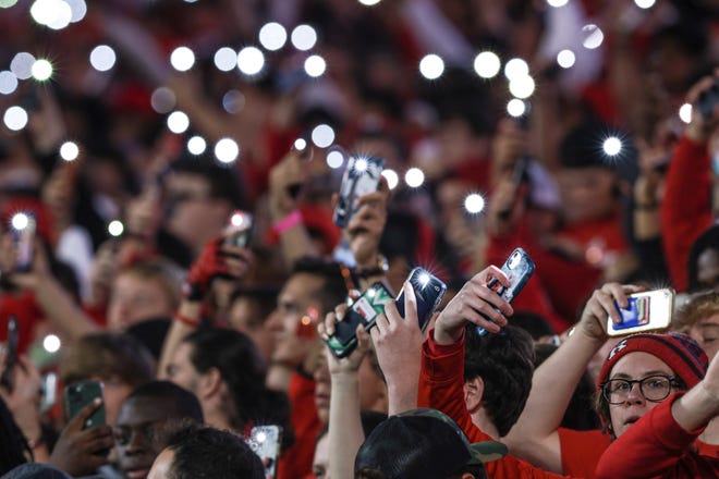 Sep 24, 2022; Piscataway, New Jersey, USA; Rutgers Scarlet Knights fans cheer during the first half against the Iowa Hawkeyes at SHI Stadium. Mandatory Credit: Vincent Carchietta-USA TODAY Sports