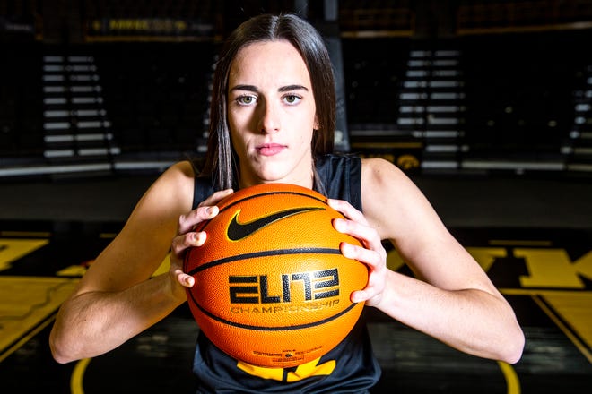 Iowa guard Caitlin Clark (22) poses for a photo during Hawkeyes women's basketball media day, Thursday, Oct. 20, 2022, at Carver-Hawkeye Arena in Iowa City, Iowa.