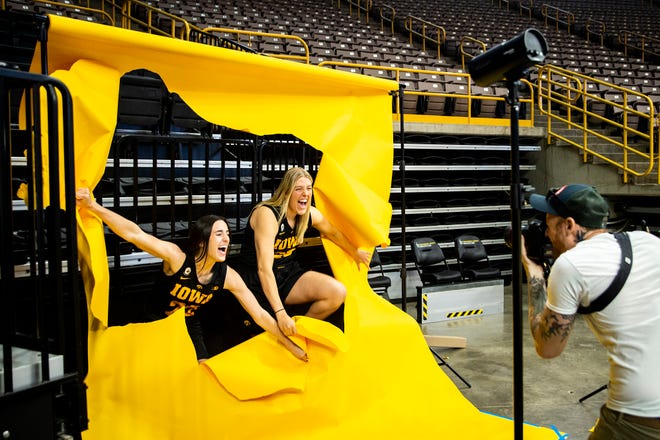 Iowa guard Caitlin Clark, left, and Iowa center Monika Czinano pose for a photo during Hawkeyes women's basketball media day, Thursday, Oct. 20, 2022, at Carver-Hawkeye Arena in Iowa City, Iowa.