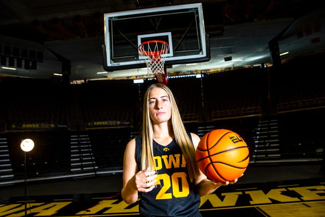 Iowa guard Kate Martin (20) poses for a photo during Hawkeyes women's basketball media day, Thursday, Oct. 20, 2022, at Carver-Hawkeye Arena in Iowa City, Iowa.