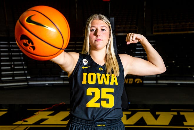 Iowa center Monika Czinano (25) poses for a photo during Hawkeyes women's basketball media day, Thursday, Oct. 20, 2022, at Carver-Hawkeye Arena in Iowa City, Iowa.