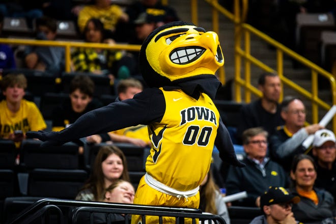Herky the Hawk leans over a railing during a NCAA women's basketball game between Iowa and Southern University, Monday, Nov. 7, 2022, at Carver-Hawkeye Arena in Iowa City, Iowa.