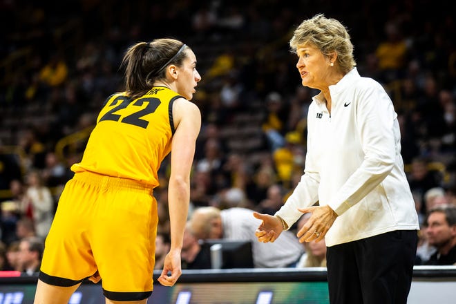 Iowa guard Caitlin Clark, left, talks with Iowa head coach Lisa Bluder during a NCAA women's basketball game against Southern University, Monday, Nov. 7, 2022, at Carver-Hawkeye Arena in Iowa City, Iowa.