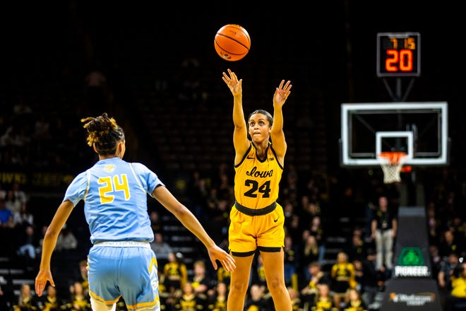 Iowa guard Gabbie Marshall, right, shoots a basket during a NCAA women's basketball game against Southern University, Monday, Nov. 7, 2022, at Carver-Hawkeye Arena in Iowa City, Iowa.