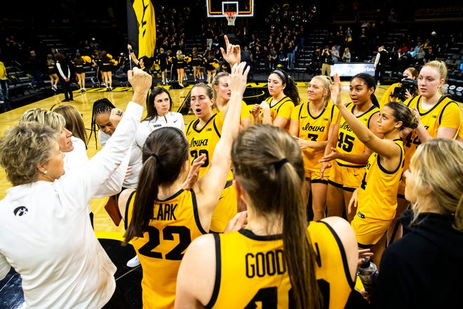 Iowa head coach Lisa Bluder huddles up with players after a NCAA women's basketball game against Southern University, Monday, Nov. 7, 2022, at Carver-Hawkeye Arena in Iowa City, Iowa.