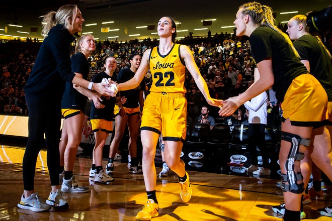 Iowa guard Caitlin Clark (22) is introduced before a NCAA women's basketball game against Southern University, Monday, Nov. 7, 2022, at Carver-Hawkeye Arena in Iowa City, Iowa.