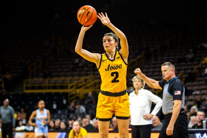 Iowa guard Taylor McCabe (2) makes a 3-point basket during a NCAA women's basketball game against Southern University, Monday, Nov. 7, 2022, at Carver-Hawkeye Arena in Iowa City, Iowa.