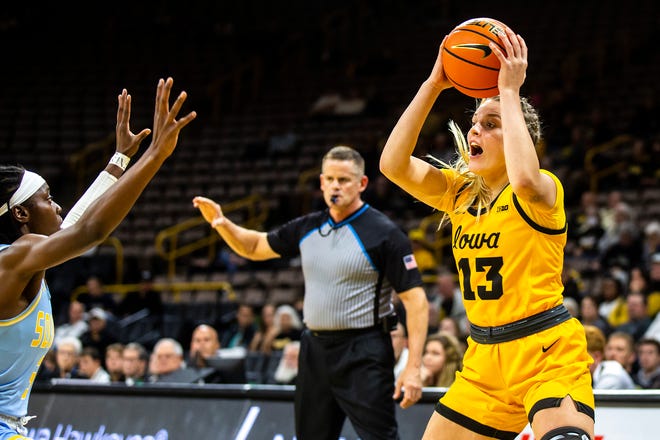 Iowa forward Shateah Wetering (13) looks to pass during a NCAA women's basketball game against Southern University, Monday, Nov. 7, 2022, at Carver-Hawkeye Arena in Iowa City, Iowa.