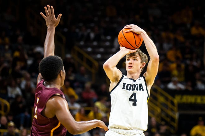 Iowa guard Josh Dix (4) shoots a basket during a NCAA men's basketball game against Bethune-Cookman, Monday, Nov. 7, 2022, at Carver-Hawkeye Arena in Iowa City, Iowa.