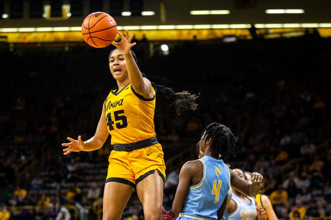 Iowa forward Hannah Stuelke (45) passes the ball during a NCAA women's basketball game against Southern University, Monday, Nov. 7, 2022, at Carver-Hawkeye Arena in Iowa City, Iowa.