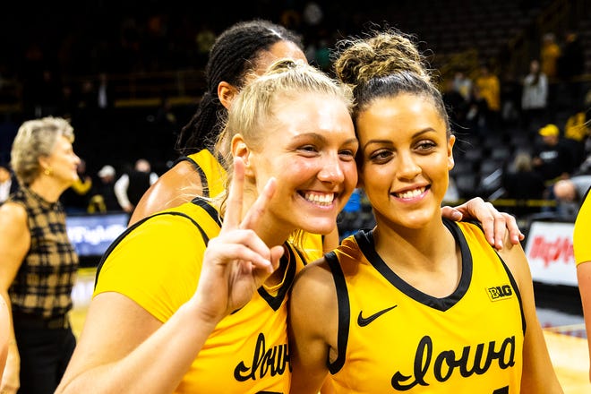 Iowa guard Sydney Affolter, left, and Gabbie Marshall (24) pose for a photo after a NCAA women's basketball game against Evansville, Thursday, Nov. 10, 2022, at Carver-Hawkeye Arena in Iowa City, Iowa.
