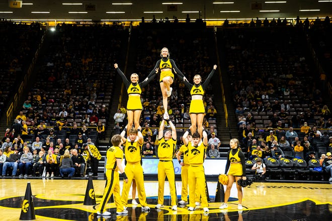 Iowa Hawkeyes cheerleaders perform during a NCAA women's basketball game against Evansville, Thursday, Nov. 10, 2022, at Carver-Hawkeye Arena in Iowa City, Iowa.