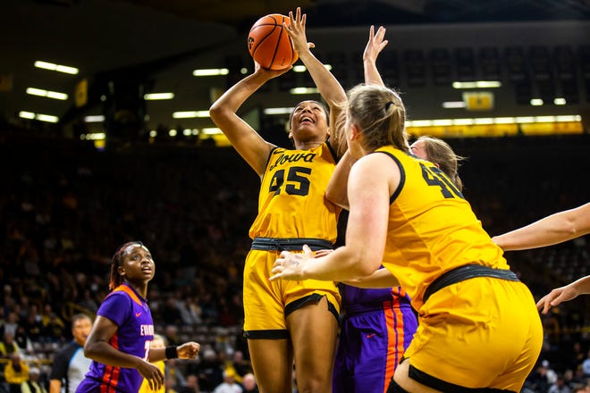 Iowa forward Hannah Stuelke (45) shoots a basket during a NCAA women's basketball game against Evansville, Thursday, Nov. 10, 2022, at Carver-Hawkeye Arena in Iowa City, Iowa.