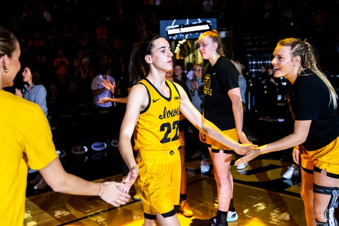 Iowa guard Caitlin Clark (22) is introduced during a NCAA women's basketball game against Evansville, Thursday, Nov. 10, 2022, at Carver-Hawkeye Arena in Iowa City, Iowa.