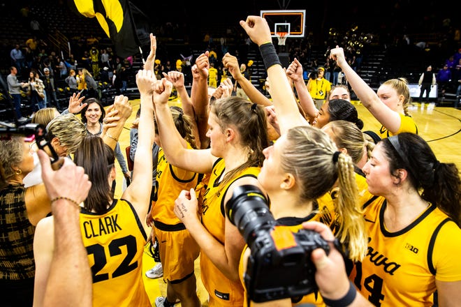 Iowa head coach Lisa Bluder huddles up with players after a NCAA women's basketball game against Evansville, Thursday, Nov. 10, 2022, at Carver-Hawkeye Arena in Iowa City, Iowa.